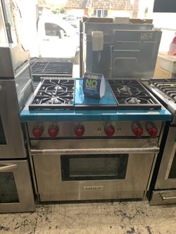 Wolf 36” slide in range with middle grill in stainless steel