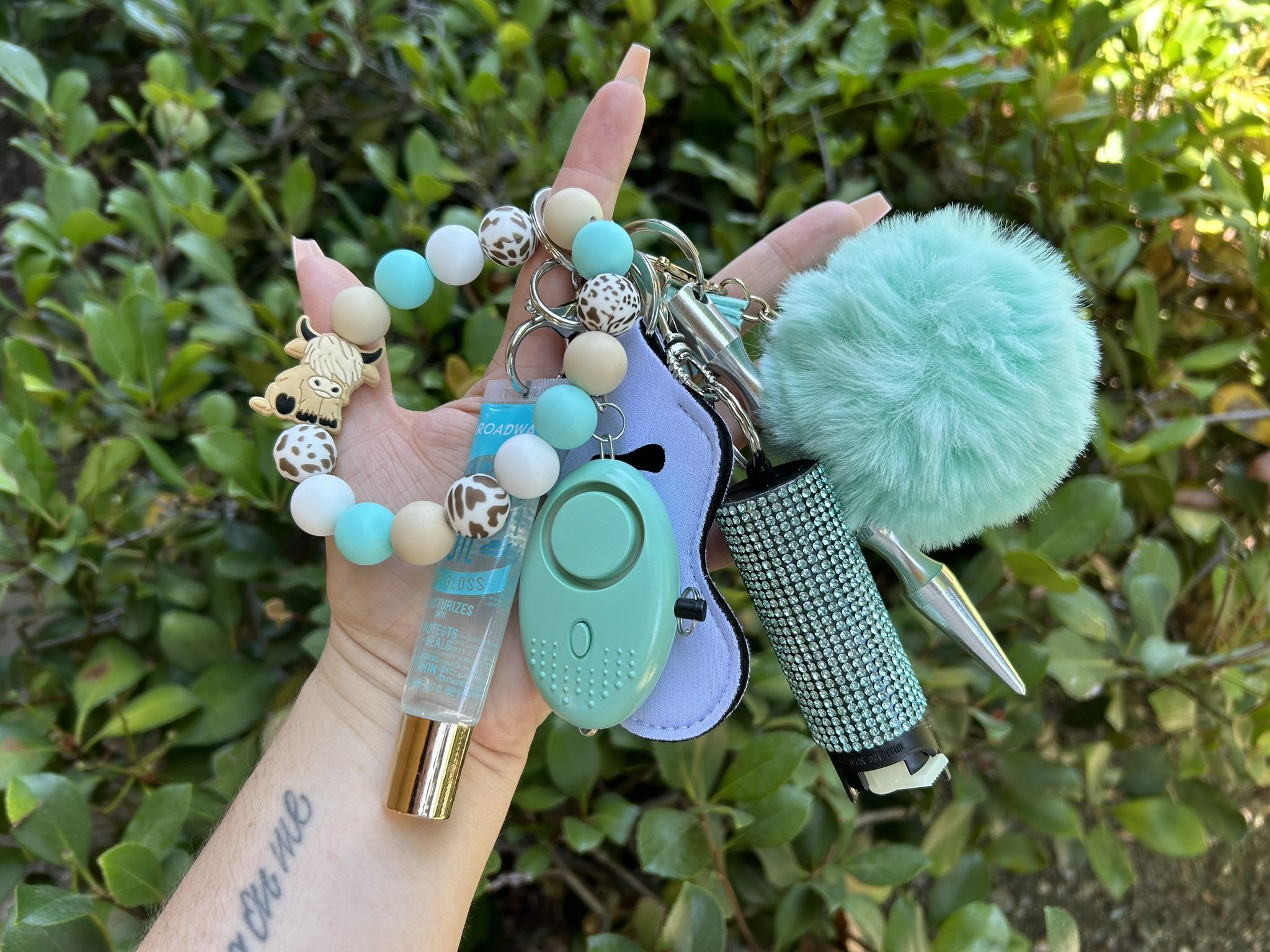 Teal Cow Wristlet