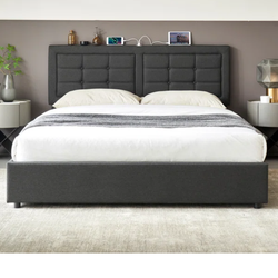 Upholstered bed frame with changing station