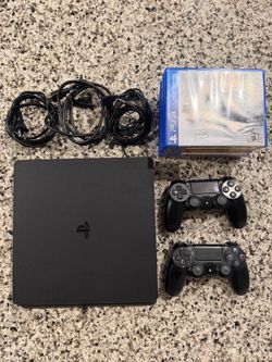 PS4 Slim 500GB Bundle – 2 Controllers + 8 Games – Tested