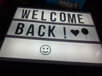 Light up sign with letters with it