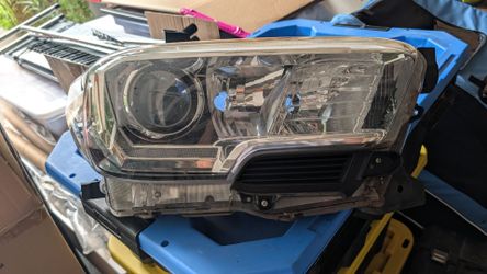 2019 Toyota Tacoma OEM headlights.