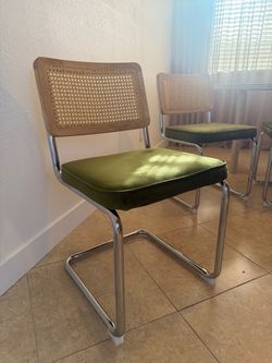 Olive green velvet chairs