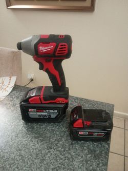 Milwaukee Impact Drill with Batteies