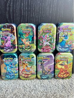 Pokemon Prismatic Evolutions Mini Tin