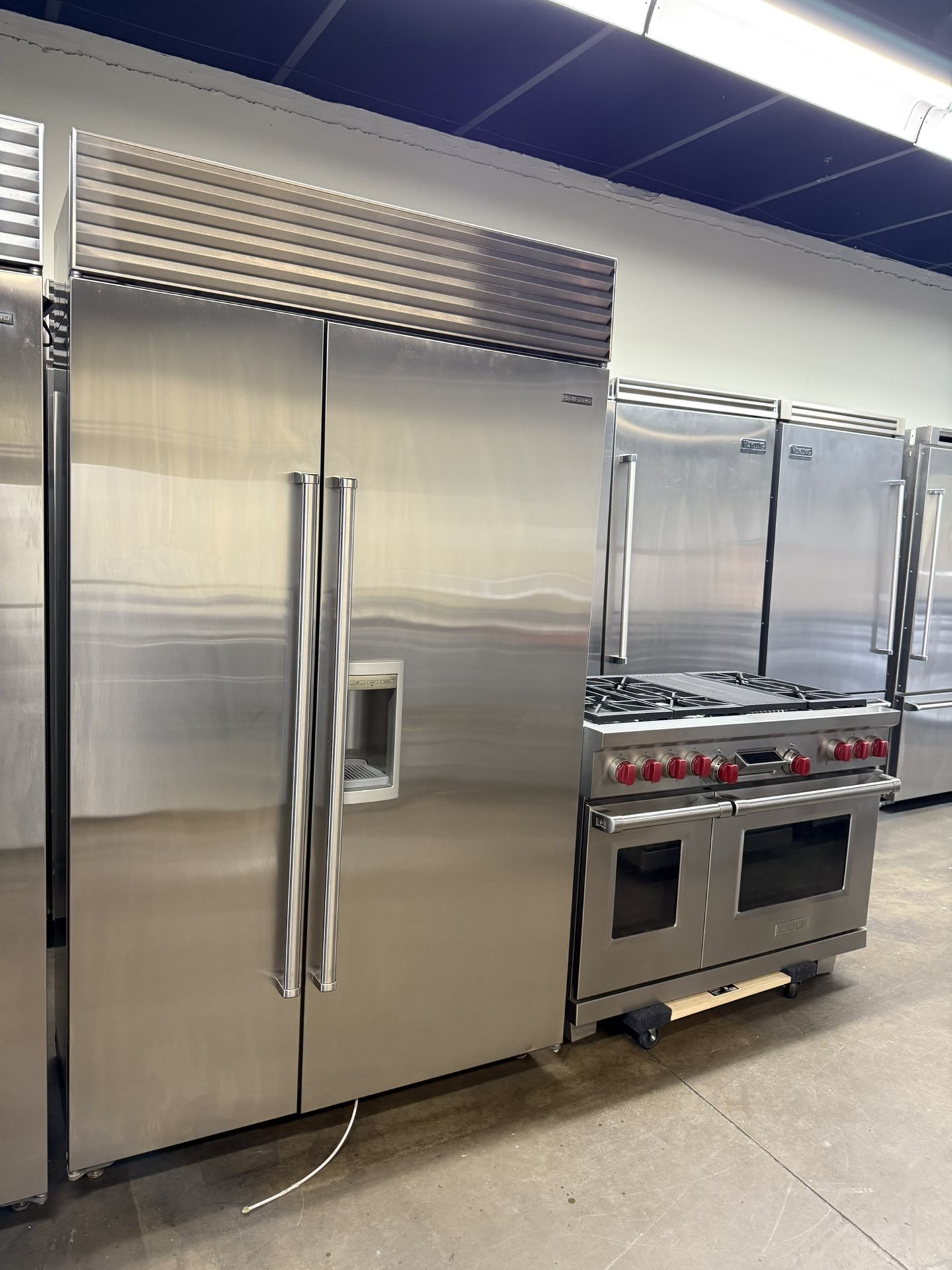 Sub Zero 48” Built In Refrigerator And Wolf 48” Stainless Steel Dual Fuel Gas Range Kitchen Bundle Set