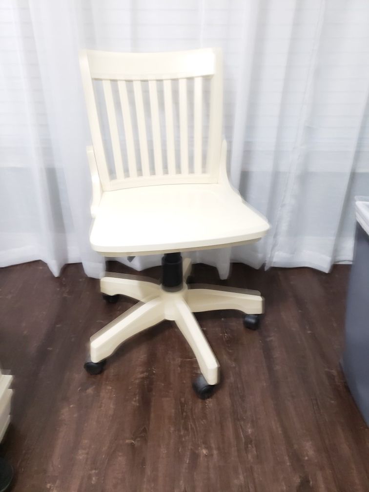 Desk chair light beige very pretty. 15 dollars