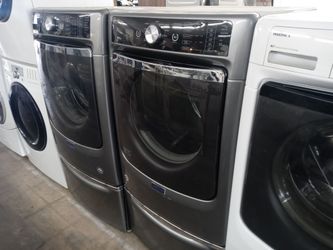 Maytag gray front load washer and gas dryer set on pedestals - Free delivery