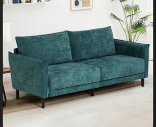 Gently used teal couch