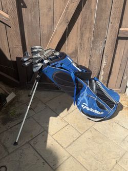 TaylorMade golf clubs. And bag $140
