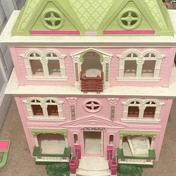 Two Fisher Price Mansions