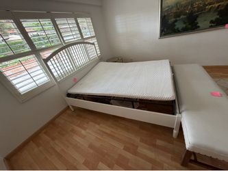 Queen size wooden bed frame with metal box frame. Will need to dismantle it