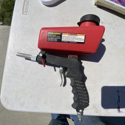 BLAST GUN WITH GRAVITY FEED