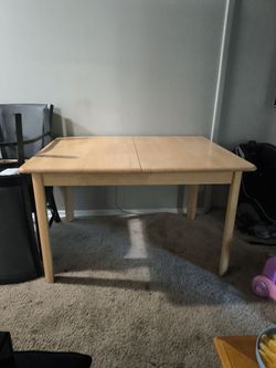 Mesa expandible de madera + microondas