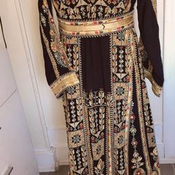 Embroidered Palestinian Thobes.