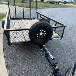2024/5X8 HEAVY DUTY HIGH SIDES UTILITY TRAILER .