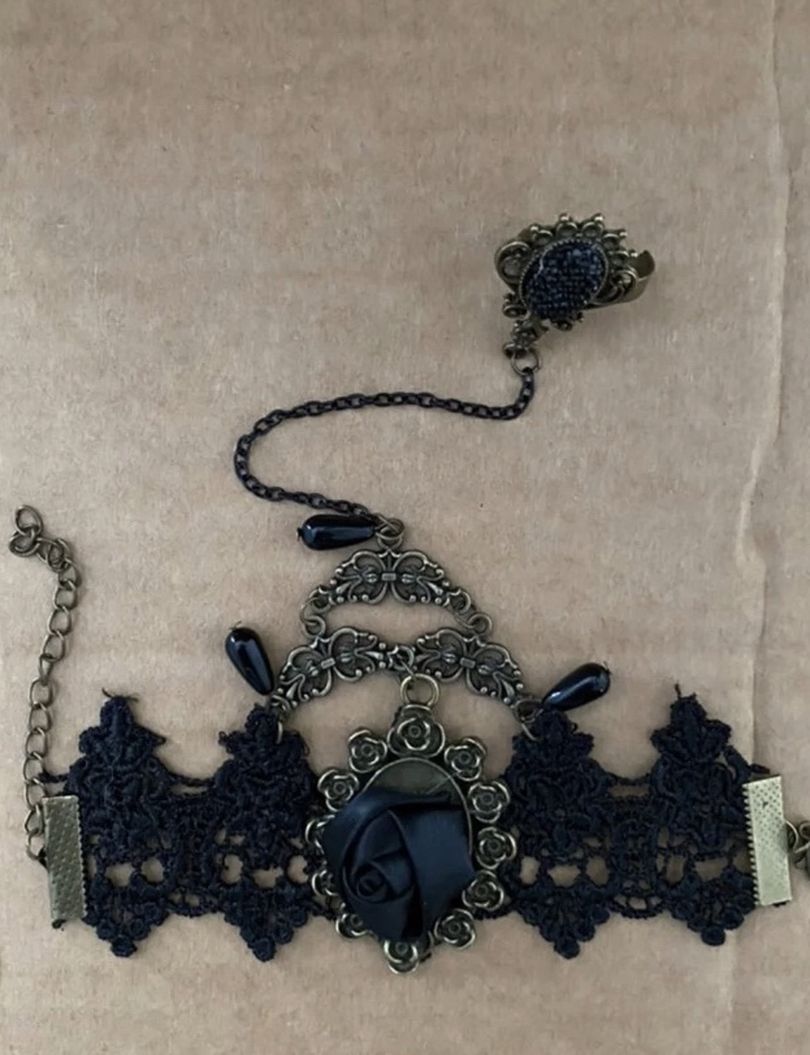 Steam punk cosplay wristlet and chain ring