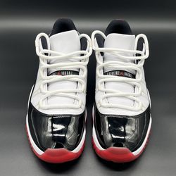Jordan 11 Low “White bred”