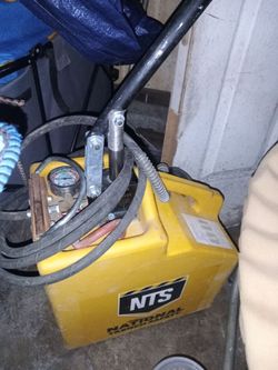 National Trench Safety (NTS) portable hydraulic hand pump can (commonly used for trench shoring and hydraulic shoring cylinders).