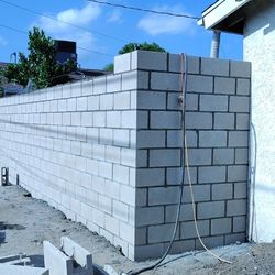 Let Us Help You With Block Fence and Driveway Projects 