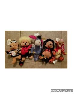 Winnie the Pooh - small plush with tags - see description