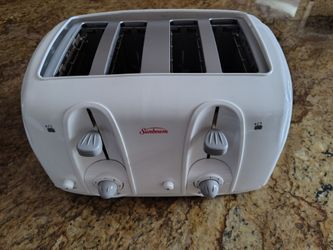 Sunbeam 4 Slice Toaster. Bagel/Bread Capable. Cook settings for different bays.