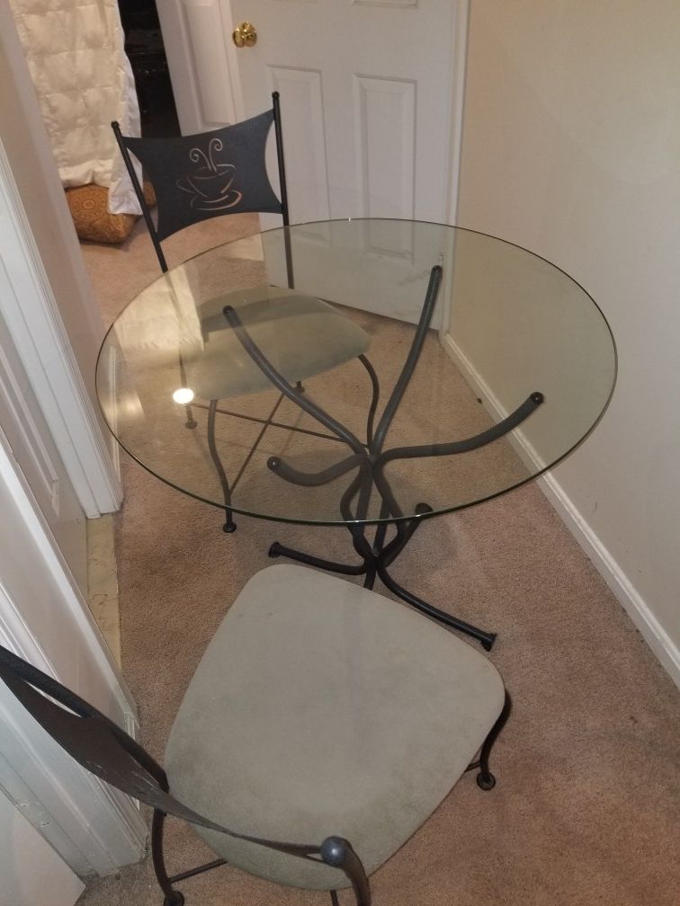 Glass breakfast table and chairs