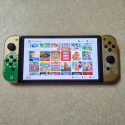 NINTENDO SWITCH OLED + 125 POPULAR SWITCH GAMES