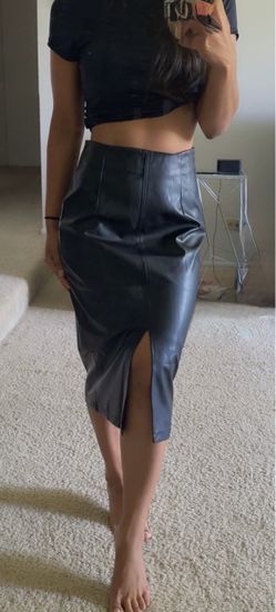 Size S faux leather midi skirt. Very stretchy.