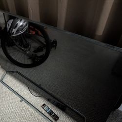 65 in lightly used LG smart TV + stand + remote + wall mount