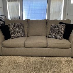 Grey Sofa And Single Grey Chair