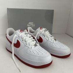 Nike Air Force 1 '07 in the "White/Dragon Red" colorway. This classic low-top silhouette features a white leather upper with a bold red Swoosh, matchi