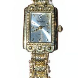 Elegant Vintage Vanity Fair Quartz Watch with Intricate Band