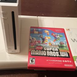 Nintendo Wii, Wii Fit Board, 2 games, & 2 controllers