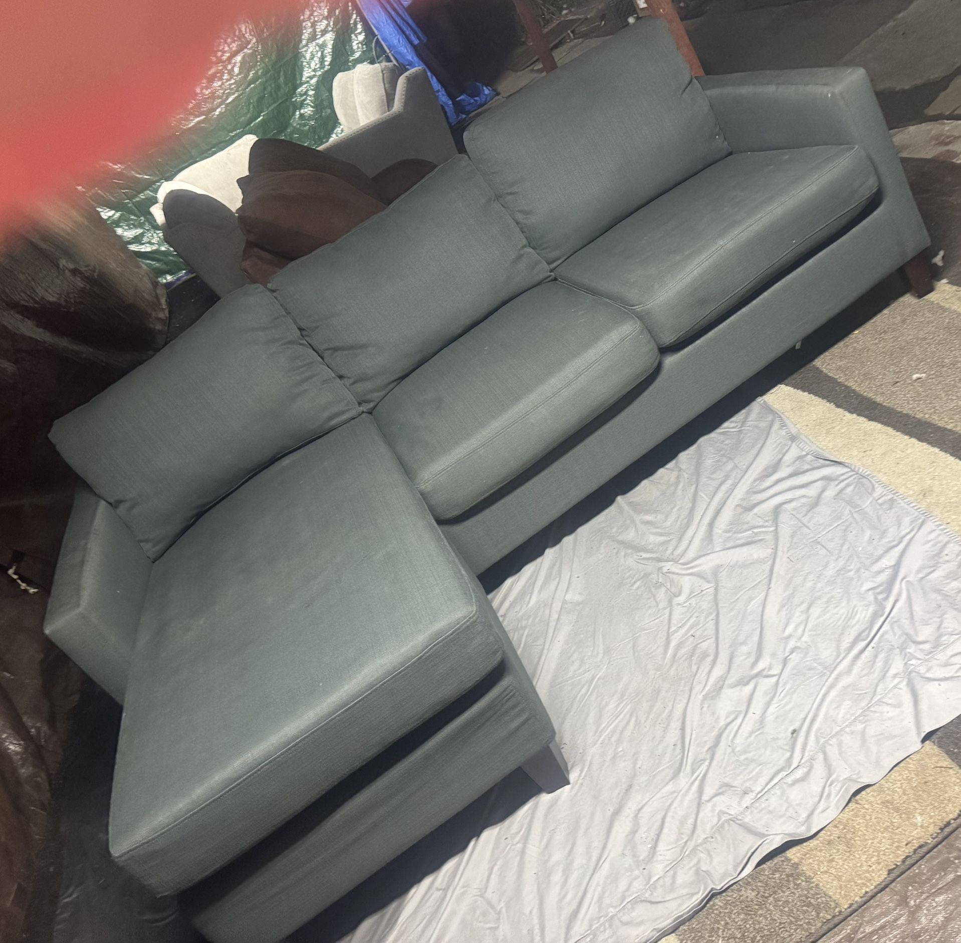 Grey couch with reversible chase good condition clean we sell all the time delivery $40 local