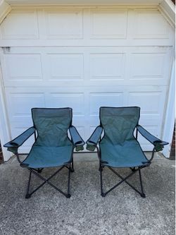 Two outdoor folding armchairs