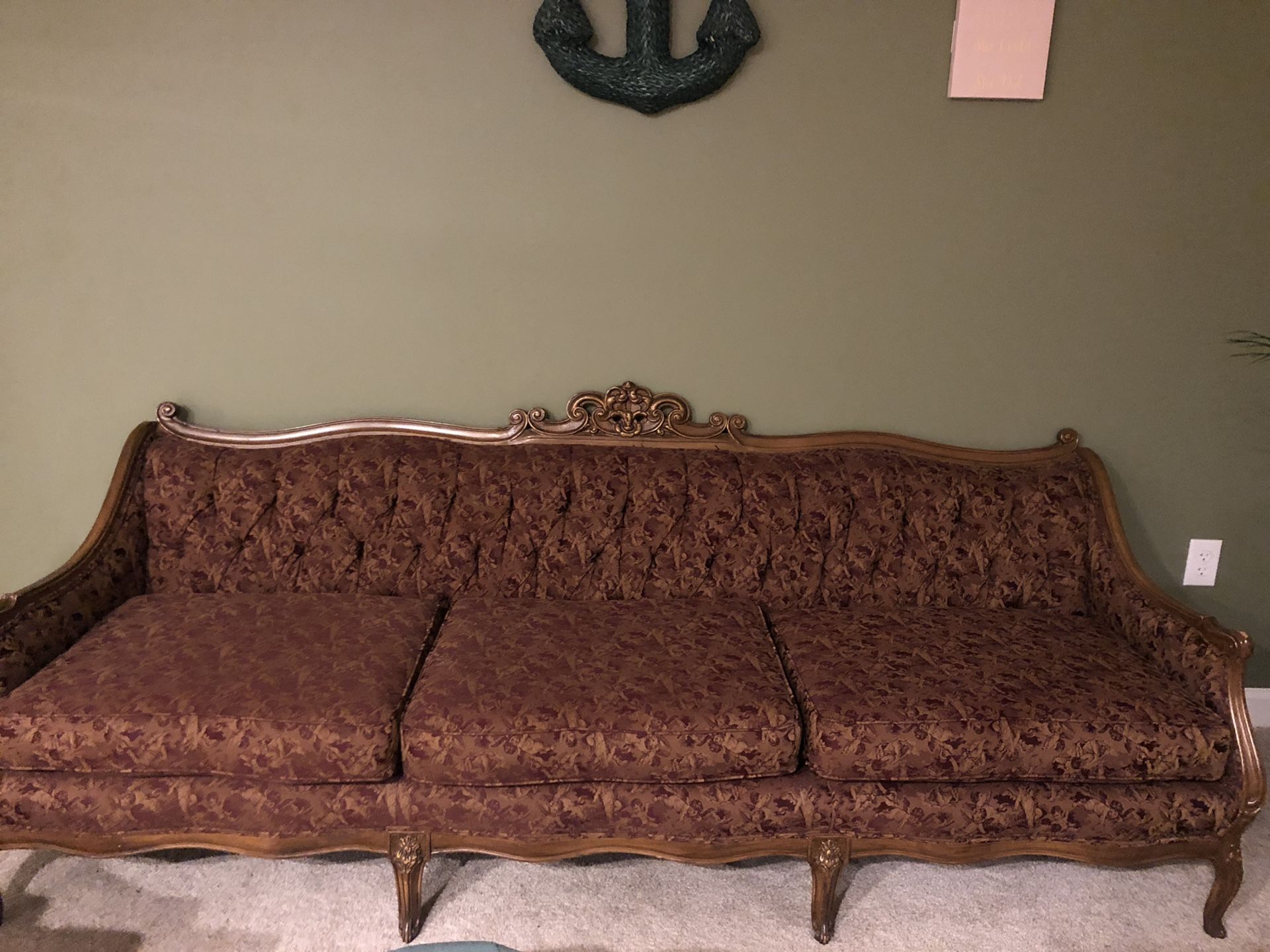 Antique couch (little angels as design)