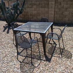 Metal Table And Four Chairs