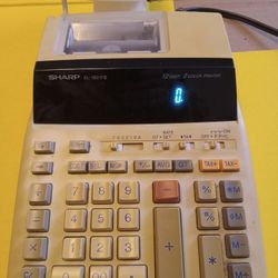 Sharp Adding Machine.