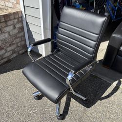 Black leather swivel adjustable computer chair