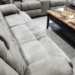 Top of the line Ashley dual reclining sofa and loveseat