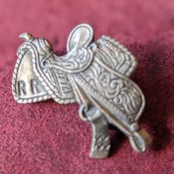 For Sale, Silver Metal Saddle Pin With The Initials RR On It $10