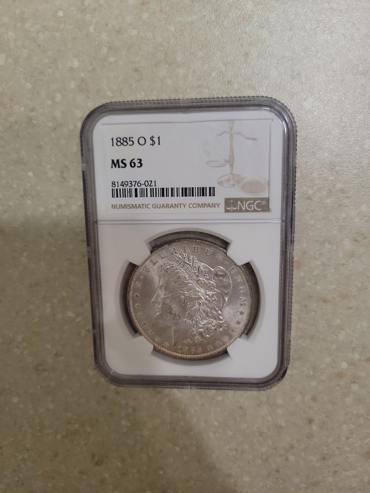1885 O Morgan Silver Dollar.  Graded 