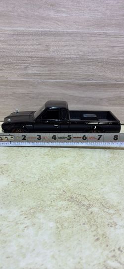 1972 Datsun 620 Black Die-Cast Pickup Truck Model