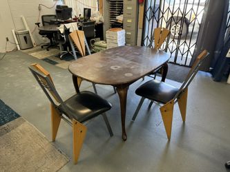 Dining Table And Four Chairs