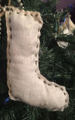 Hand sewn embroidered linen ornament