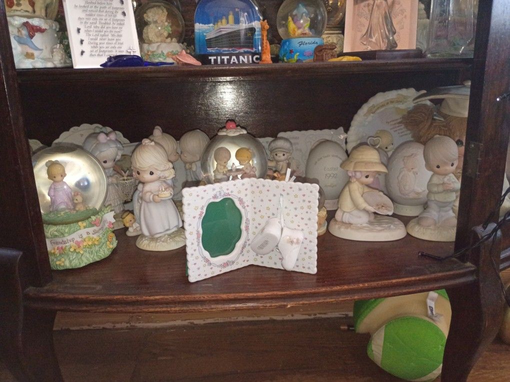 Precious Moments  approximately 25 pieces 
