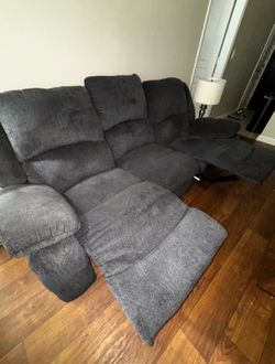 Sofa with two recliners attached- three seater
