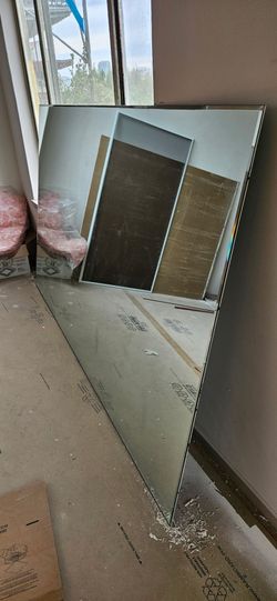 Free very large mirror, with a few small defects