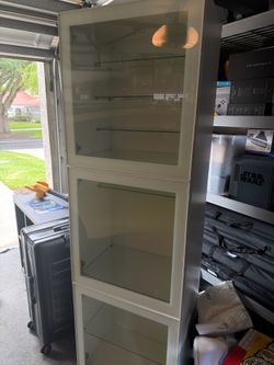 White Besta Shelf with glass shelves